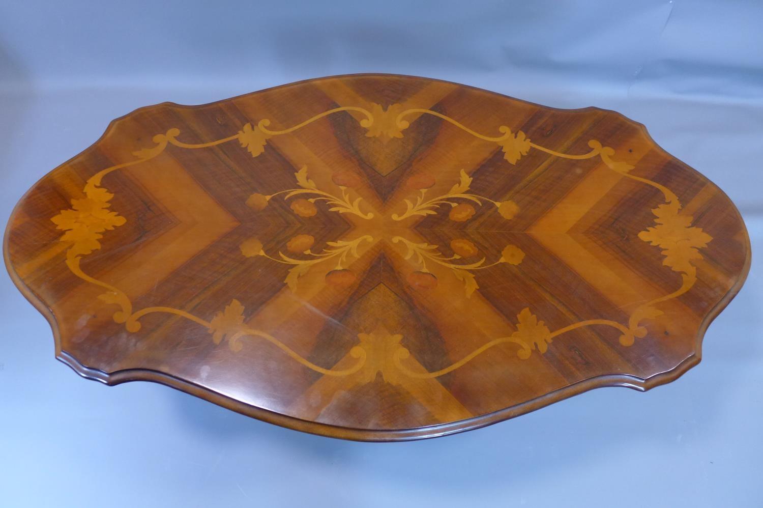A modern Italian coffee table, decorated with scrolling foliage, on quadriform base and scrolling - Image 3 of 3