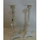 A pair of white painted cast iron pricket sticks, H.43cm