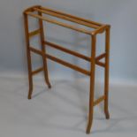 An Art Nouveau inlaid mahogany towel stand