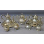 A collection of Middle Eastern silver plated ware, to include teapots, jugs and trays