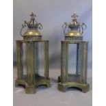 A pair of contemporary storm lanterns, with crown finial, H.70cm