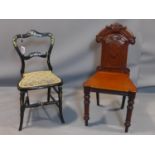 Two chairs, to include a Victorian ebonised and mother of pearl inlaid chair, and a hand carved