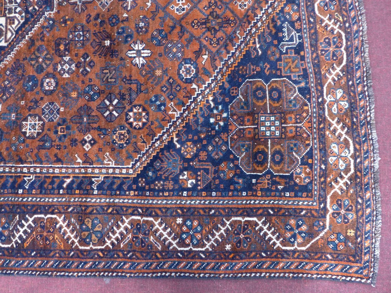 A South-West Persian Qashqai carpet, central diamond medallion with repeating petal and animal - Image 2 of 5