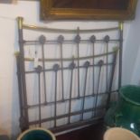 A 20th century brass and iron bed frame, 146 x 106cm