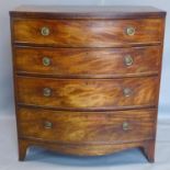 A George III mahogany bow fronted chest of 4 drawers, on splayed legs, H.107 W.98 D.56cm
