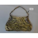 A zebra hand bag by Maliparmi