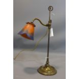 A vintage brass adjustable table lamp with Art Glass shade