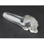 A crystal quartz opium pipe with carved skull decoration