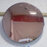 A contemporary ciruclar mirror by Coach, marked to reverse D.53cm