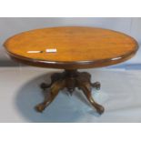 A Victorian walnut oval tilt top loo table. H.74 L.133 D.102cm