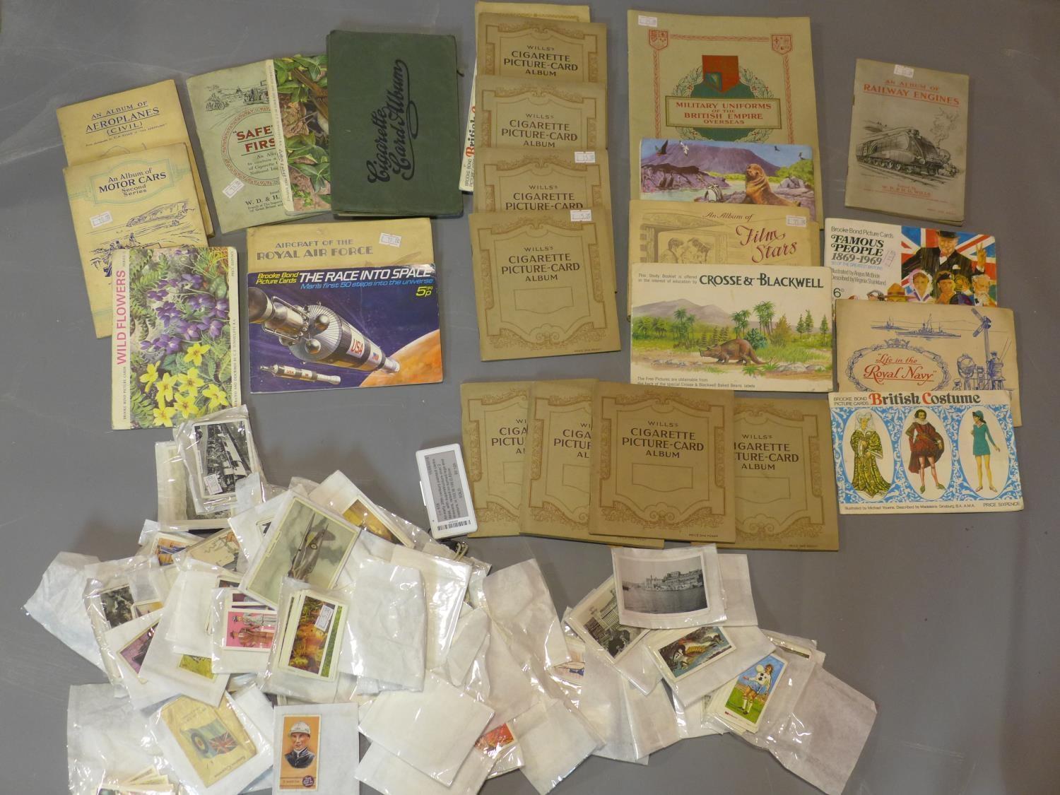 A large collection of cigarette cards and cigarette card albums (qty)