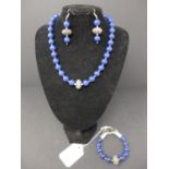 A set of lapis lazuli; beaded necklace, bangle and earrrings.