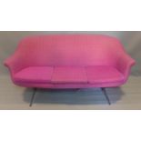 A three seater sofa with pink upholstery, H.85 W.170 D.66cm