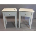 A pair of white Laura Ashley bedside tables, with single drawer, raised on square tapered legs, H.66