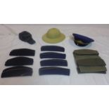 A collection of military hats to include a Blue Russian Soviet military officers cap, a Finnish