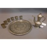 A Middle Eastern plated coffee set, decorated with scrolling foliage, to include a hot water pot (