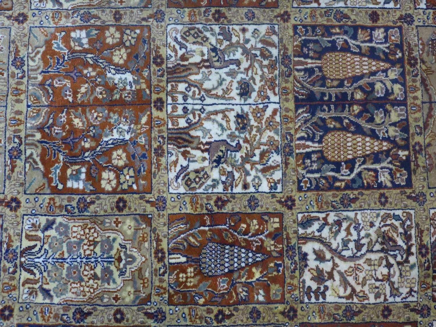 A Persian Tabriz carpet, made from English wool, with garden design having panels of stylised - Image 2 of 5