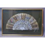 A 19th century framed mother of pearl decorative fan. Frame H.42 W.64cm