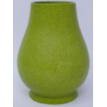 A Chinese green glazed vase, with incised character marks to body and four incised character marks