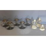 A set of 5 storm lanterns, with pierced frames and central cylindrical glass shades, H.34 W.47 D.
