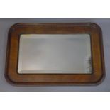 A 19th century mahogany mirror, with bevelled glass plate, 69 x 47cm