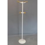 A contemporary coat stand, on circular base, H.75cm