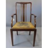 An Edwardian mahogany armchair