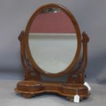 A 19th century mahogany swing mirror fitted with hinged jewellery compartments. H.75cm