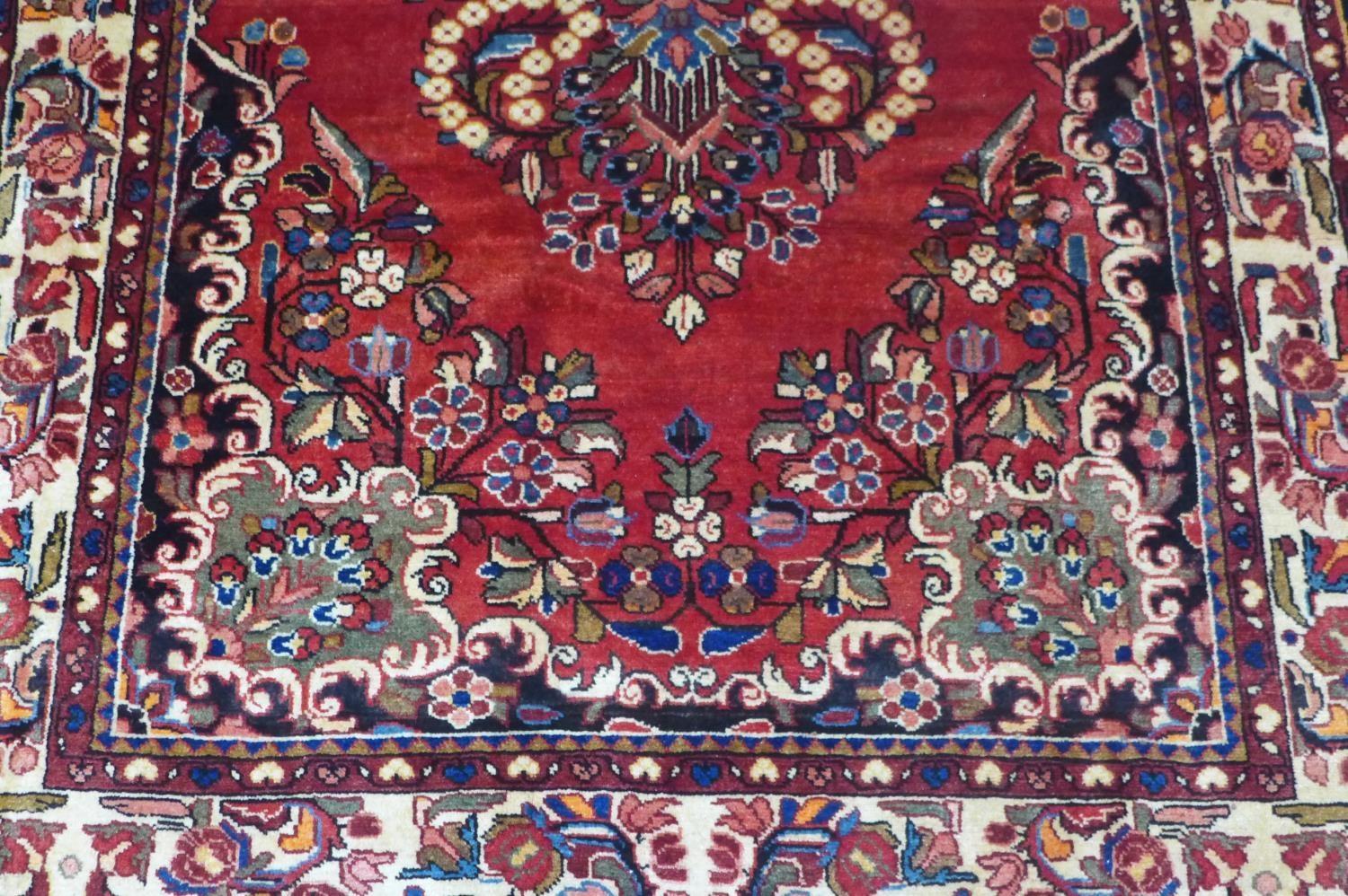 A South-West Persian Lilihan rug, central double pendent medallion with repeating petal motifs on - Image 3 of 5
