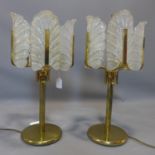 A pair of 1960's Carl Fagerlund for Orrefors table lamps, with textured glass shades modelled as