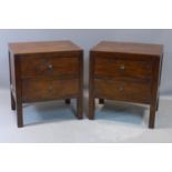 A pair of stained teak Lombok bedside chests of two drawers, on square legs, H.62 W.56 D.43cm