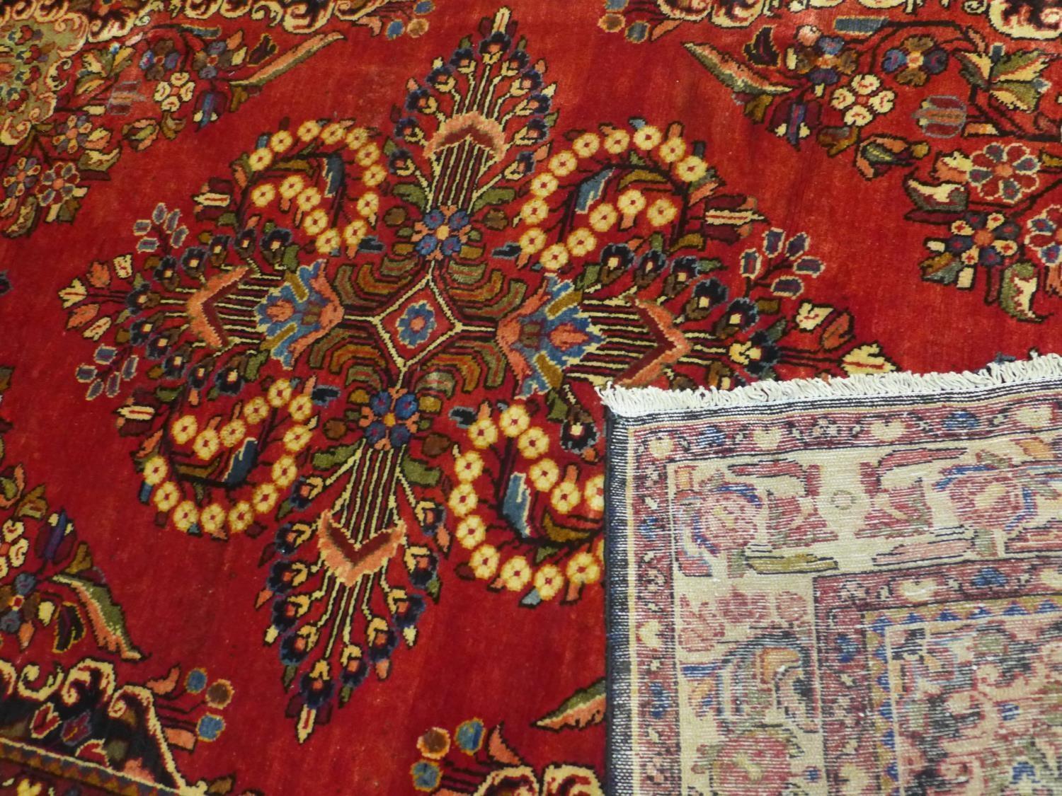 A South-West Persian Lilihan rug, central double pendent medallion with repeating petal motifs on - Image 5 of 5