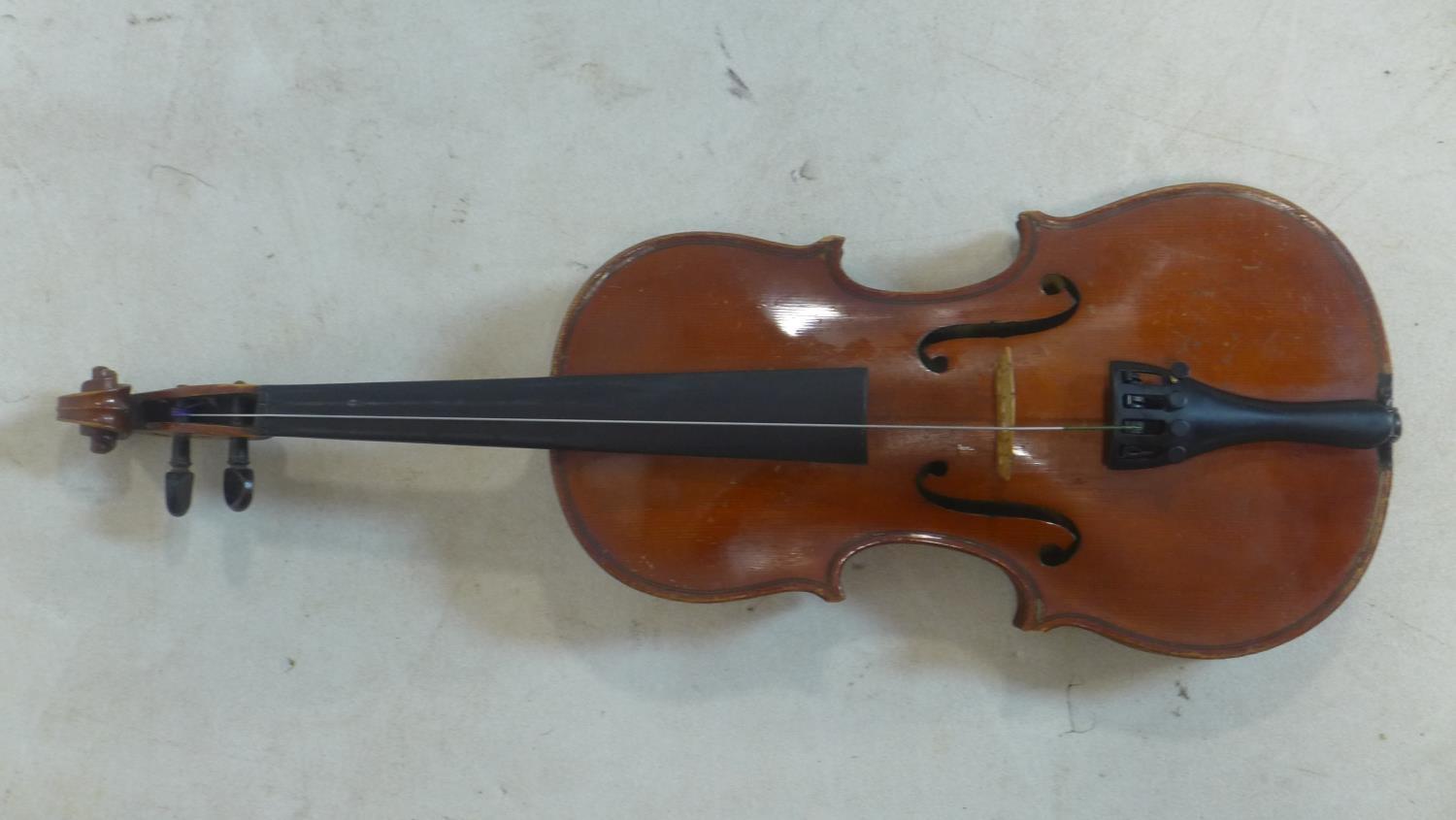 A students violin in fitted case