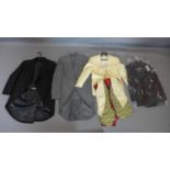 A collection of vintage men's clothing to include morning suits and waistcoats