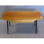A teak coffee table with lift up top, on splayed dansette legs, H.49 W.97 D.40cm