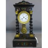 A late 19th century French clock, having a white Roman dial, the inlaid architectural ebonised