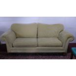 A three seater sofa with cream floral upholstery