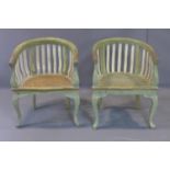 A pair of distressed painted tub chairs with cane seats and splat backs, on cabriole feet, H.80cm