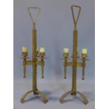 A pair of 1960's Spanish Arts & Crafts style table lamps by Ferro Art, made from gilded forged iron,