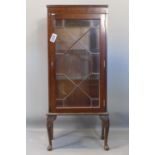 A 20th century mahogany display cabinet, H.123 W.54 D.31cm