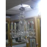 A Venetian style 5 branch glass chandelier, with glass droplets, H.104 W.115cm