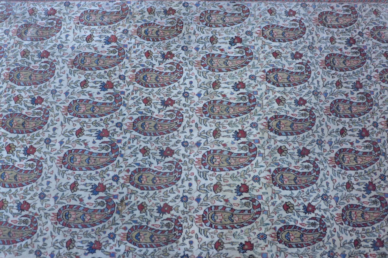 A Persian Qum rug, with all over Boteh motifs on a cream ground, within stylised floral borders, 216 - Image 3 of 5