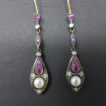 A boxed pair of silver and yellow gold Art Deco drop earrings set with diamonds, pearls and