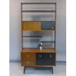 A mid 20th century G-plan Librenza room divider by E. Gomme, with an arrangement of shelves, drawers