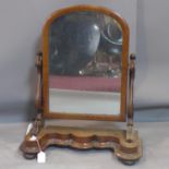 A 19th century mahogany swing mirror on platform base, H.76cm