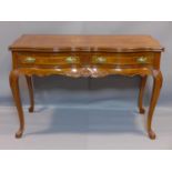 A Queen Anne style walnut serpentine table, with two short drawers, on cabriole legs, H.78 W.118 D.