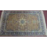 An antique Turkish Hereke silk rug of French design, with central floral medallion and stylised