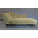A chaise longue with button back corduroy upholstery, on turned legs and castors, H.78 W.180 D.70cm