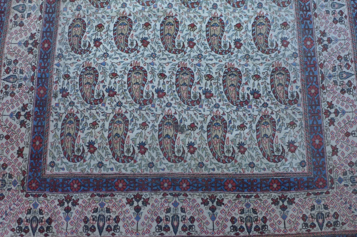 A Persian Qum rug, with all over Boteh motifs on a cream ground, within stylised floral borders, 216 - Image 2 of 5