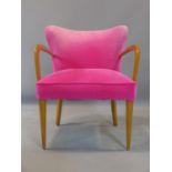 A mid 20th century beech wood chair with pink upholstery